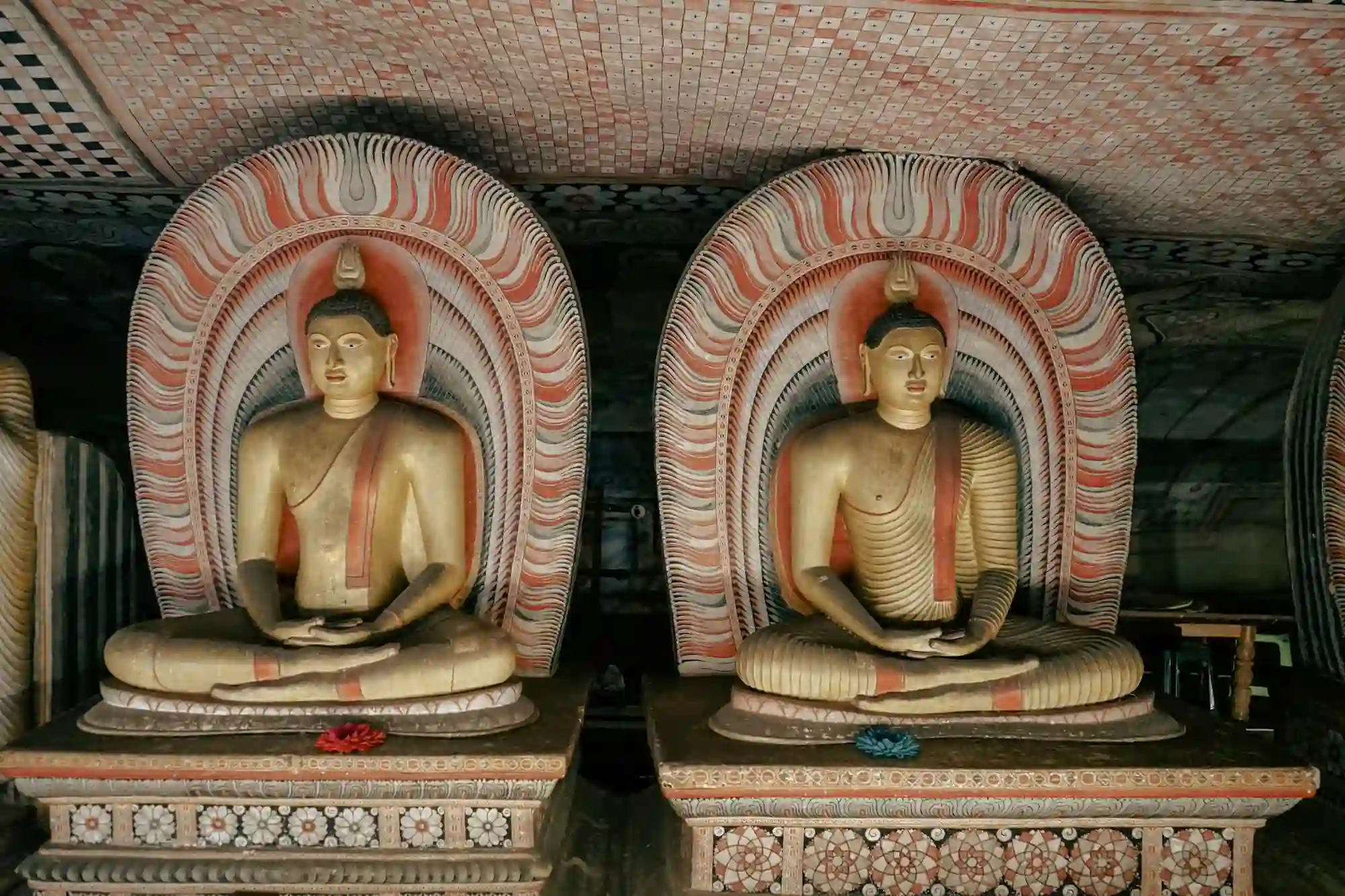 Twin Seated Buddha Statues with Ornate Halos