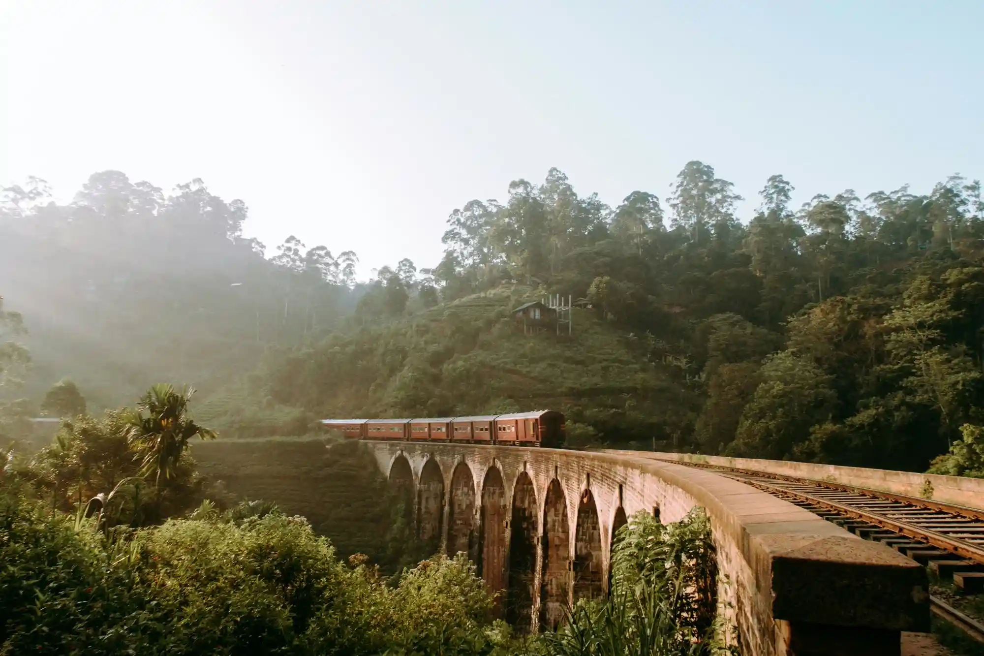 Train Crossing the Iconic Nine Arch Bridge
